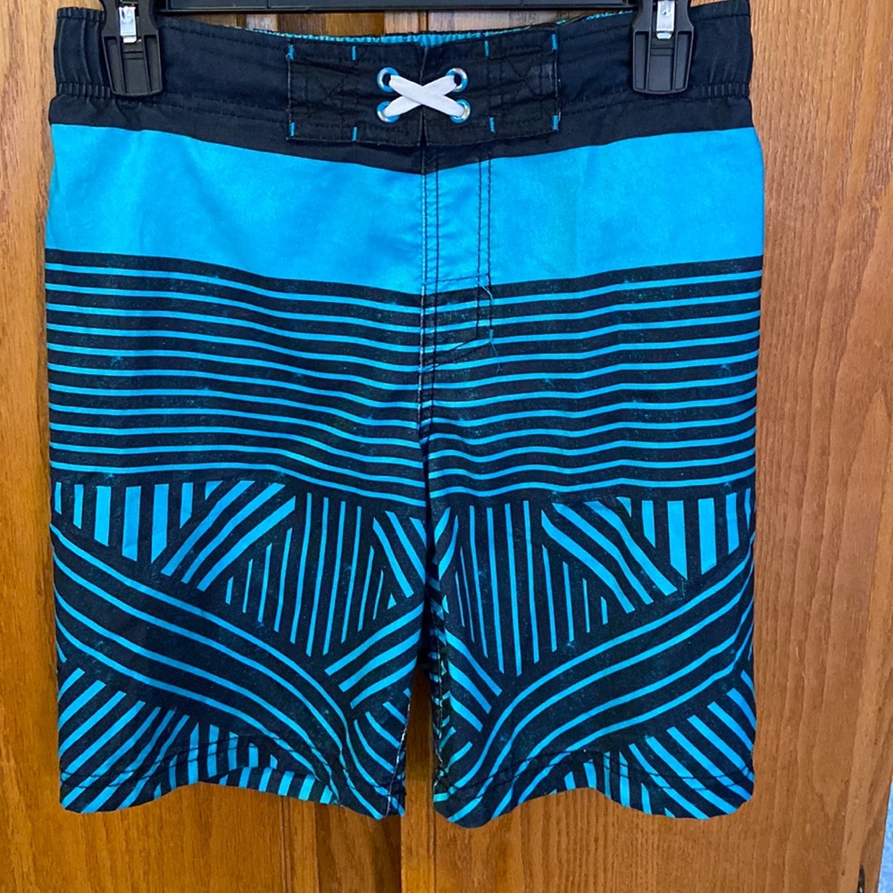 Boys Cherokee swim trunks.  Turquoise and black.  Size M.  Excellent condition